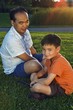 Father And Son At The Park Together