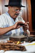 man making luxury handmade cuban cigare