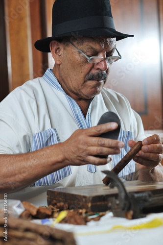 Photo: man making luxury handmade cuban cigare man making luxury handmade cuban cigare