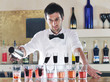 pro barman prepare coctail drink on party