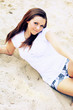 Photo: Pretty smiling girl relaxing outdoor Pretty smiling girl relaxing outdoor