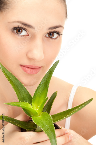Photo: woman's face with aloe woman's face with aloe