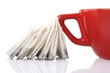 Red Ceramic cup with tea bags Red Ceramic cup with tea bags
