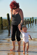 Foto: grandmother with granddaughter at the beach grandmother with granddaughter at the beach