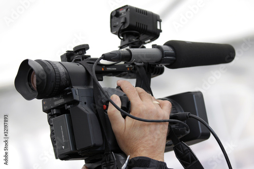Photo: Cameraman and video camera Cameraman and video camera