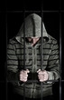 man in prison cell