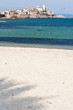 tropical beach with palm shadow