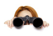 Teen redhead girl with binoculars isolated on white background