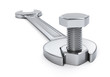 Wrench fixing nut and bolt - isolated