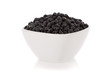 Photo en ligne au meilleur prix Black turtle beans in a bowl isolated on a white background.
