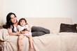 Mother and daughter watching TV