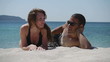 HD720p50 Happy young couple relaxing on the beach.