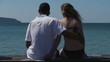 HD720p50 Happy young couple relaxing on the beach.