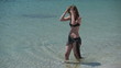 HD720p Sexy woman in bikini on the beach