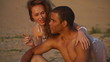 HD720p50 Happy young couple relaxing on the beach.