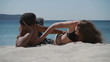 HD720p50 Happy young couple relaxing on the beach.