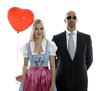 Frau im Dirndl mit Bodyguard Frau im Dirndl mit Bodyguard