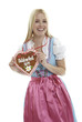 Woman with German Lebkuchen heart Woman with German Lebkuchen heart