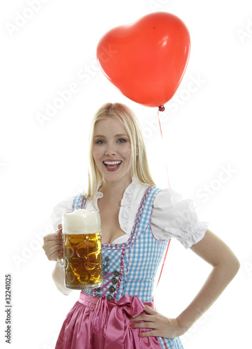 Foto: Frau im Dirndl mit Ballon Frau im Dirndl mit Ballon
