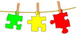 Puzzleteile auf Wäscheleine