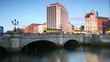 Cars and passer-by on O'Connell bridge on Liffey bridge Cars and passer-by on O'Connell bridge on Liffey bridge
