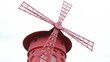 red mill with rotating blades