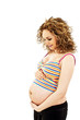 Photo: Happy pregnant woman touching her belly Happy pregnant woman touching her belly