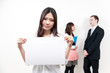 asian woman holding a blank whiteboard