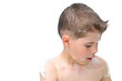 A boy swims in the bathtub