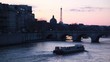 ship moves on river to stone bridge of night in Paris ship moves on river to stone bridge of night in Paris