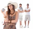Summer portrait of young woman with men behind