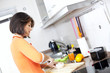 Woman preparing her breakfast