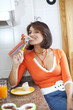 Woman eating her breakfast