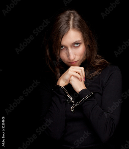 young woman with handcuffed