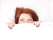 Young beautifull brunette is hiding under the blanket. Young beautifull brunette is hiding under the blanket.