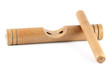 Wooden claves isolated on a white background.