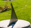 An Outdoor Sundial in a Park Setting An Outdoor Sundial in a Park Setting
