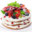 Cake with fresh fruits isolated on white background, soft focus