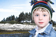 Happy Boy in Winter Clothes at Lake Park in Snow Happy Boy in Winter Clothes at Lake Park in Snow