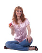 Senior woman in jeans sit with apple Senior woman in jeans sit with apple