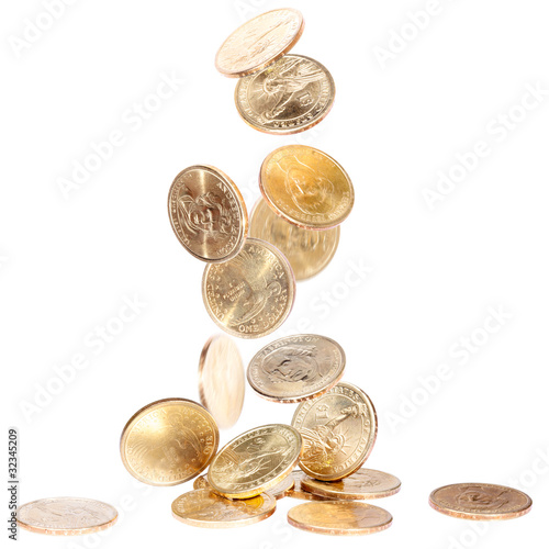 Photo: American Dollar Coins falling on the ground American Dollar Coins falling on the ground