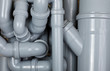 Grey PVC sewer pipes background