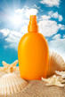 Suntan oil and sea shells