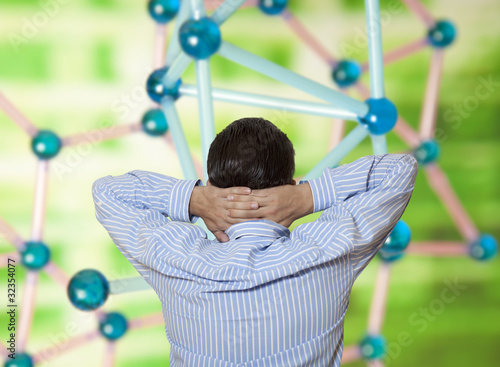 Photo: The scientist investigates molecular structure The scientist investigates molecular structure