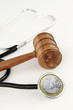 Judge’s Gavel and stethoscope with Euro money