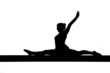 silhouette of female gymnast doing the splits on balance beam silhouette of female gymnast doing the splits on balance beam