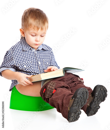 Photo: A boy sitting on the pot A boy sitting on the pot