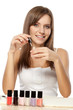 beautiful woman choosing nail polish beautiful woman choosing nail polish