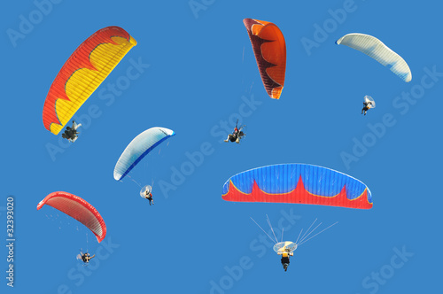 Photo: Colorful paramotor on blue sky Colorful paramotor on blue sky