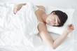 Amazing beautiful woman sleeping in her bed